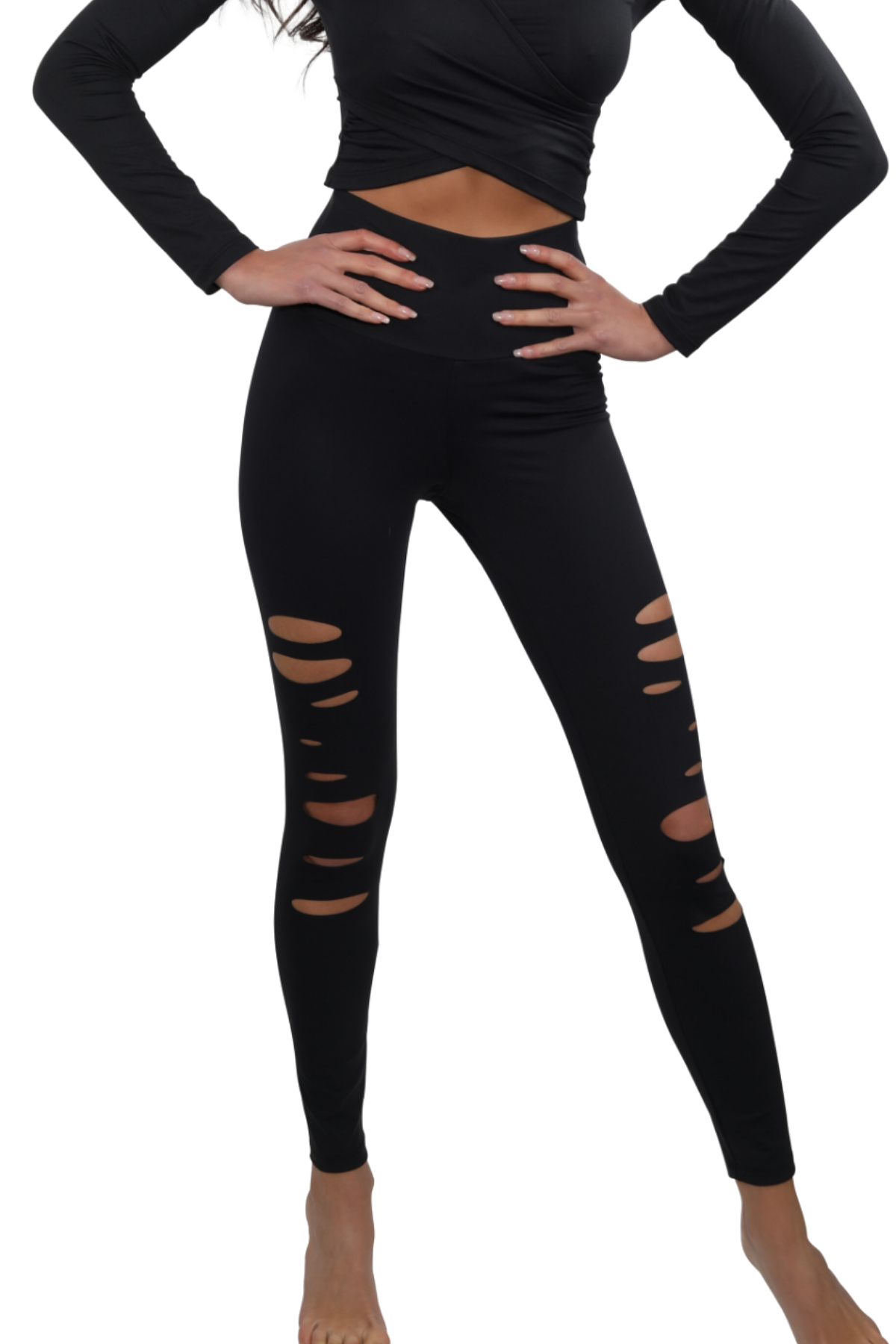 Black leggings with distressed details worn by a person on a white background